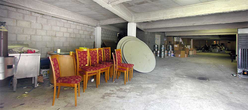 The car parking at the Greenbank Hotel being used for storage